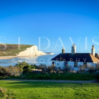 Blue Skies over Coastguard Cottages - S L Davis Photography